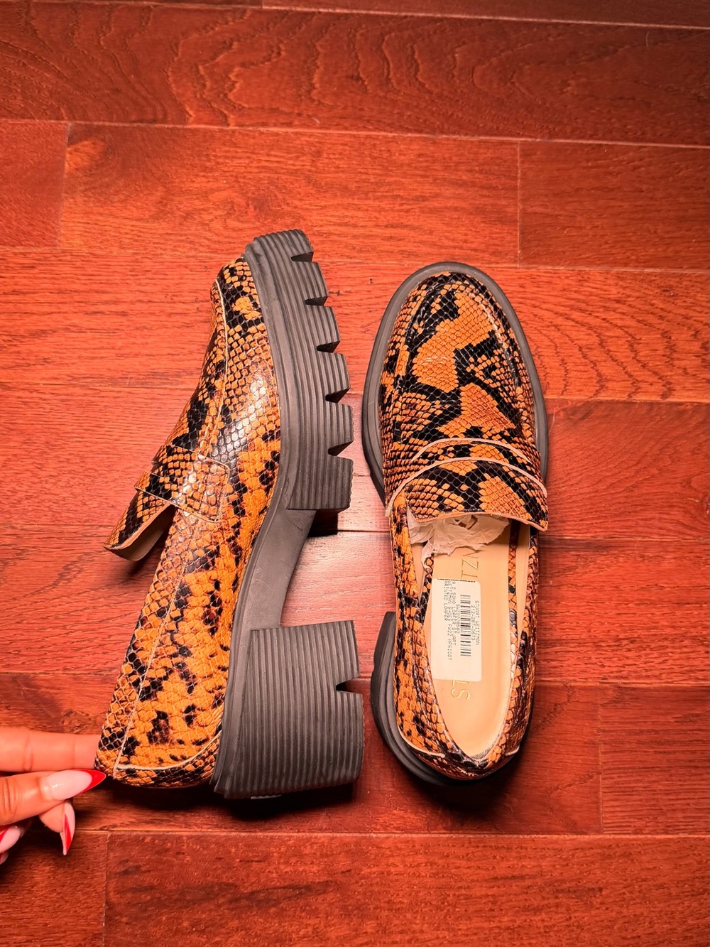Stuart Weitzman Orange and Black Snake-Print Lug Sole Loafers